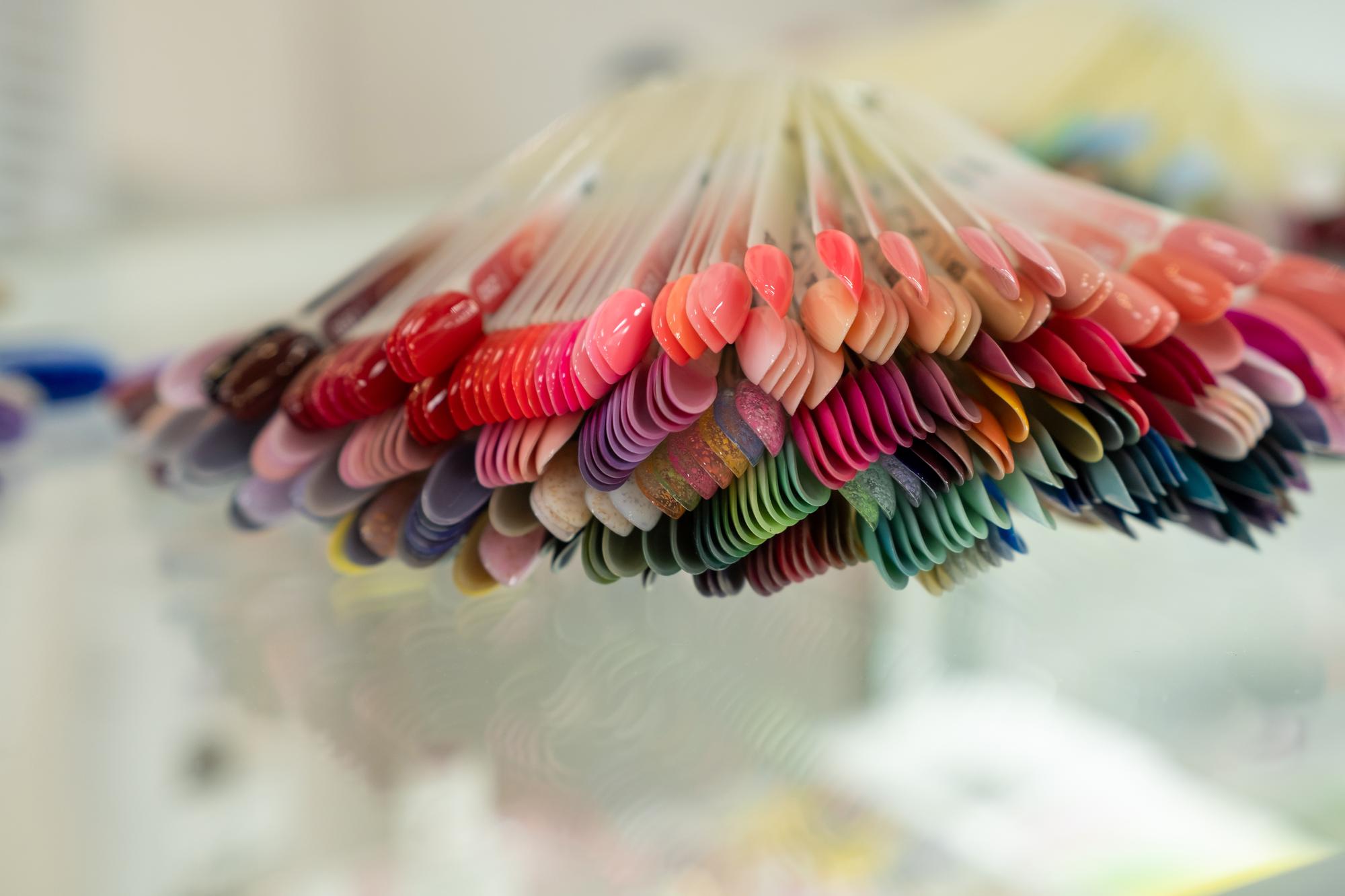 Studio storefront with embroidery samples in window